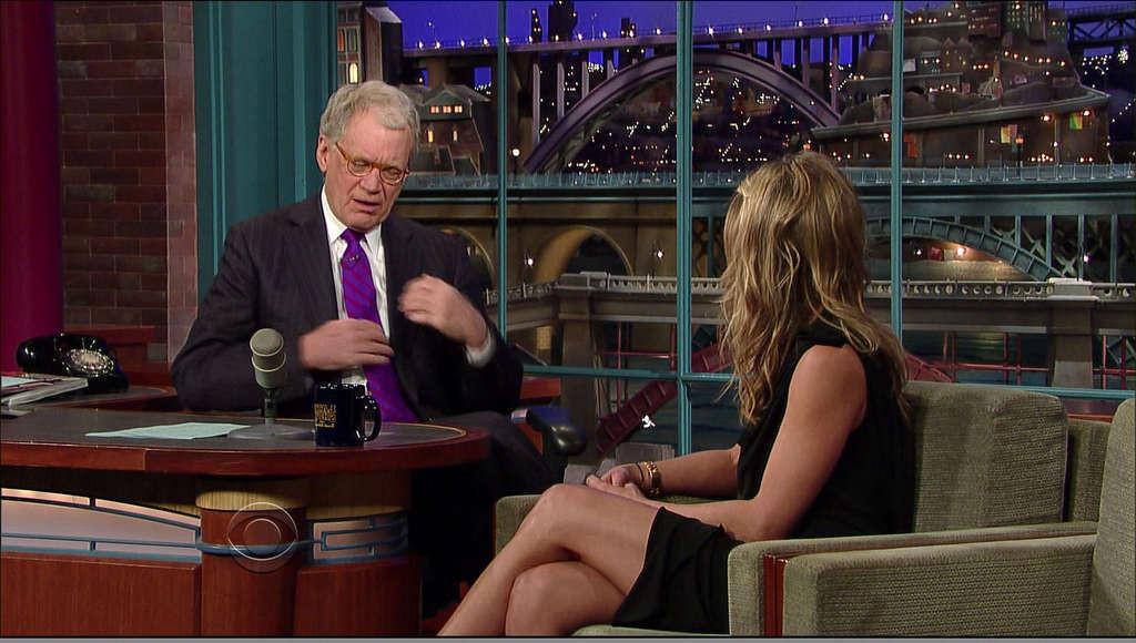 16P Jennifer Aniston showing her great legs in mini skirt on tv show