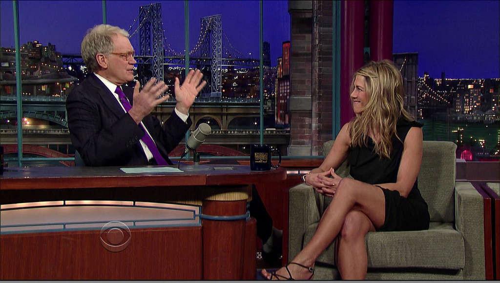 16P Jennifer Aniston showing her great legs in mini skirt on tv show