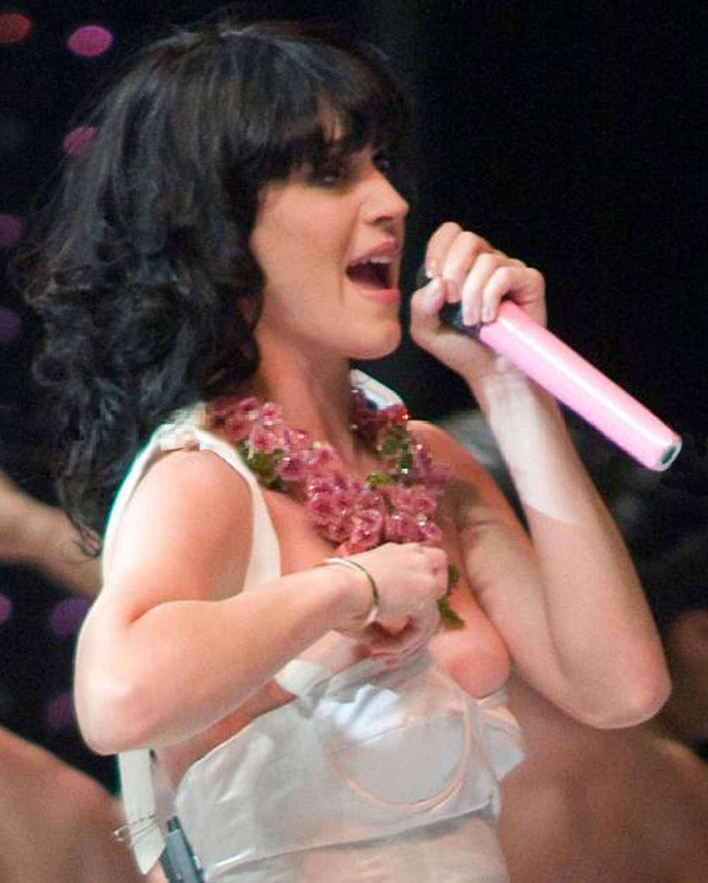 10P Katy Perry upskirt in car and very leggy in mini skirt paparazzi pictures