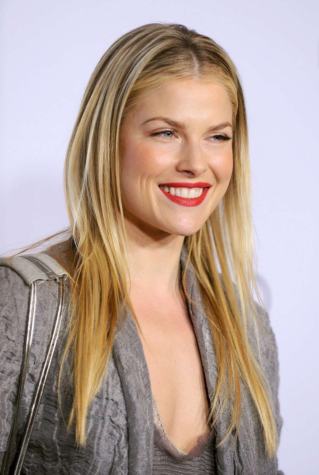 10P Ali Larter upskirt in car paparazzi pictures and very leggy in mini skirt