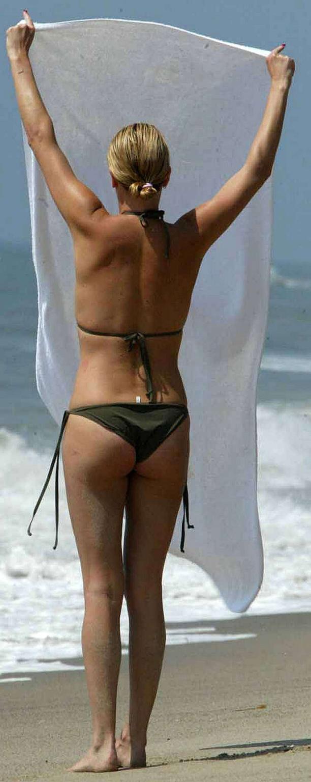 16P Charlize Theron showing her sexy underwear while she getting out of the car