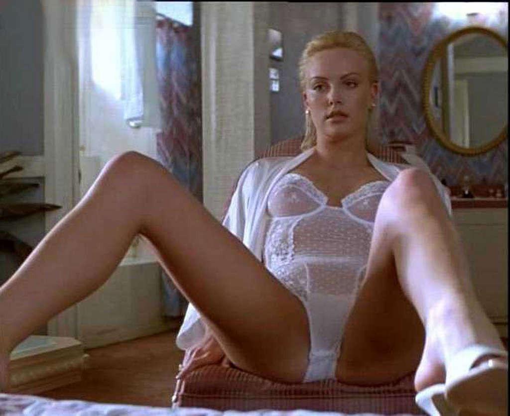 16P Charlize Theron showing her sexy underwear while she getting out of the car