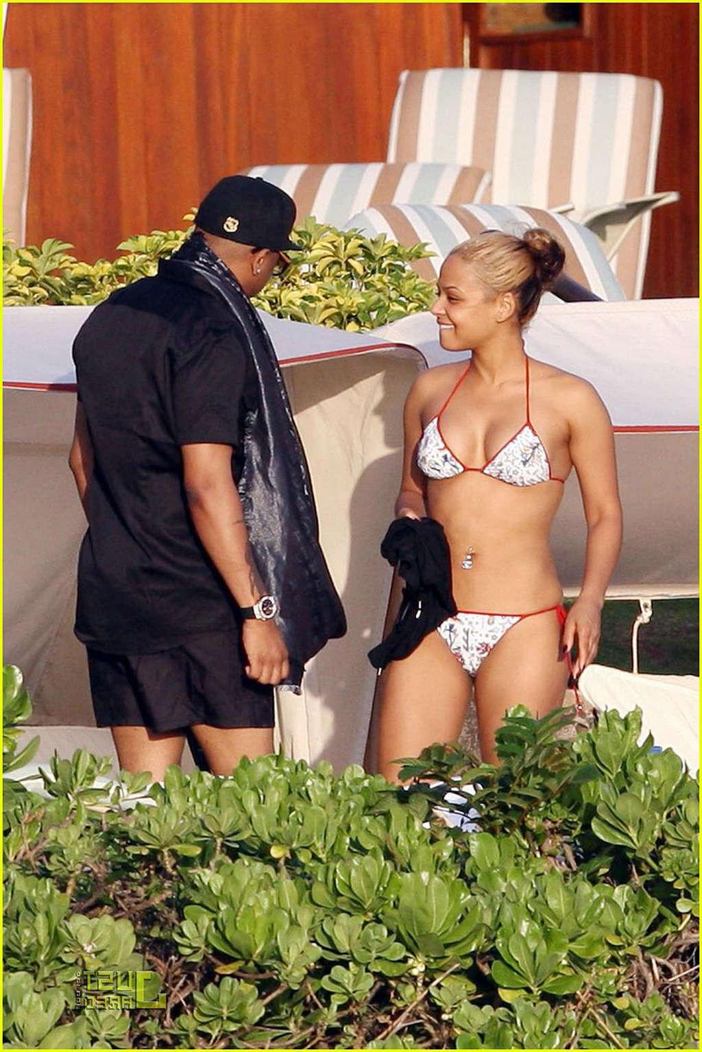 16P Christina Milian exposing her pussy upskirt in car paparazzi pictures