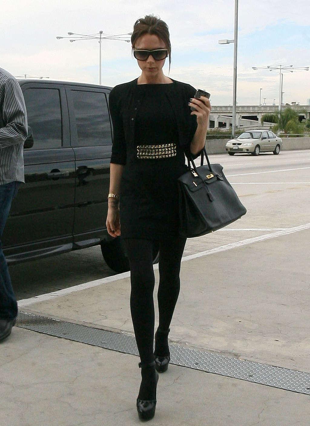 16P Victoria Beckham exposing her big tits and upskirt in car