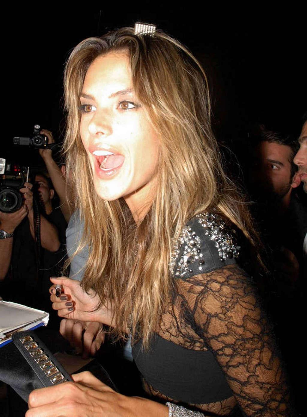 16P Alessandra Ambrosio posing with roller blades and upskirt in car