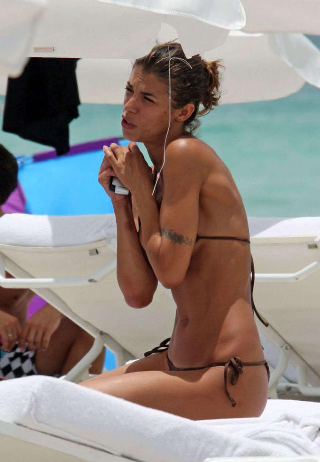 16P Elisabetta Canalis enjoying on beach and showing perfect body and sexy ass in bl