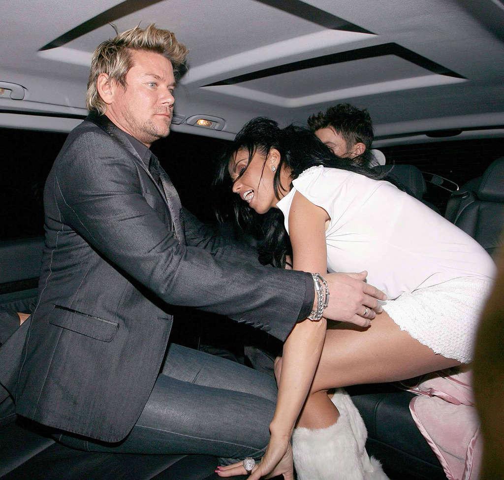 16P Katie Price upskirt in car paparazzi pictures and exposing her tits