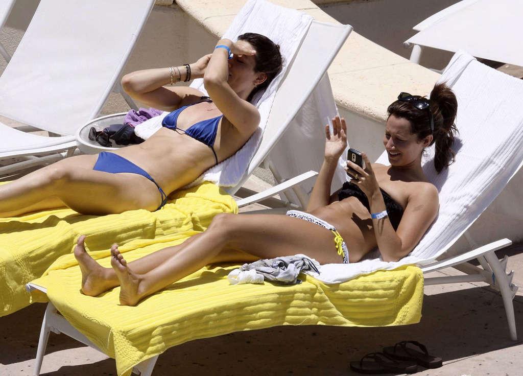 16P Ashley Tisdale in bikini relaxes poolside at her Miami hotel with friends