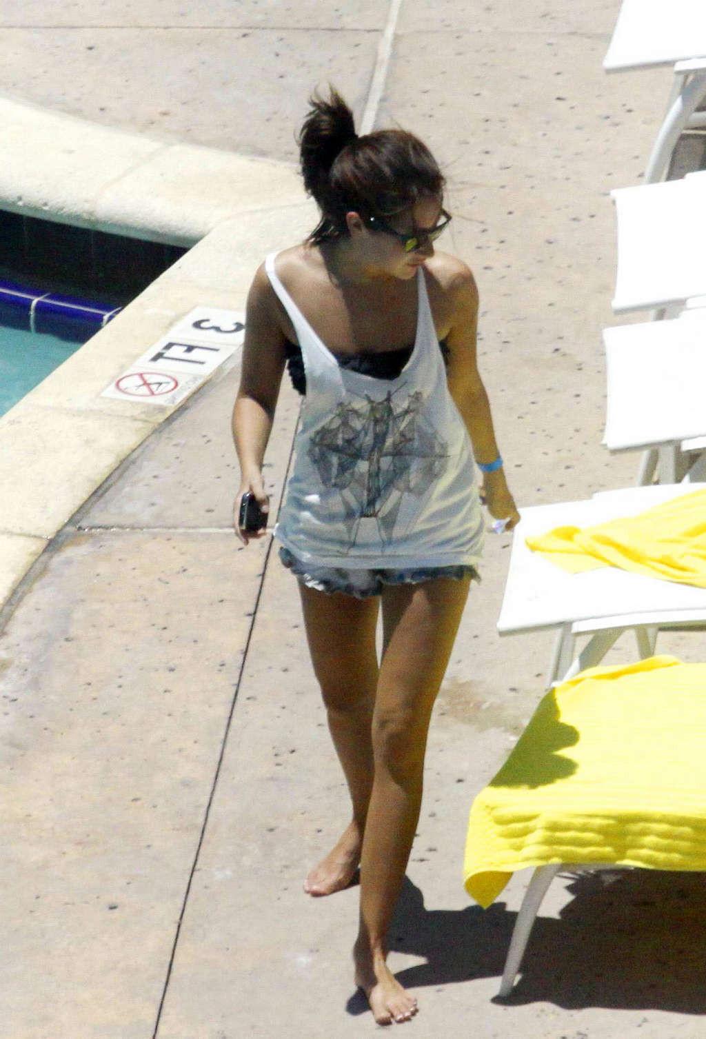 16P Ashley Tisdale in bikini relaxes poolside at her Miami hotel with friends