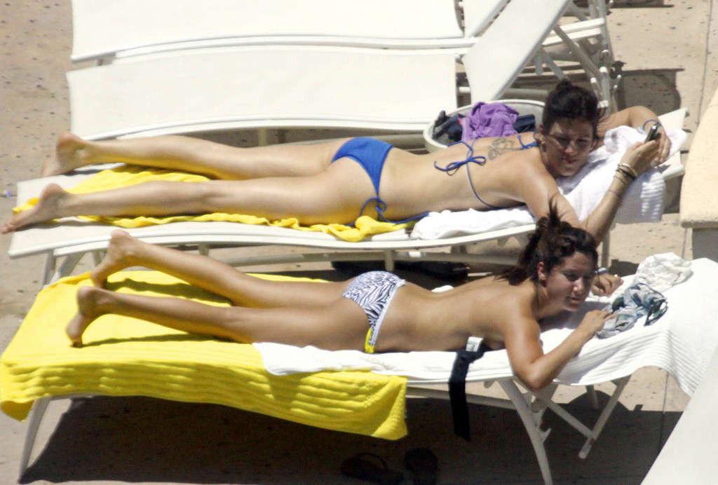 16P Ashley Tisdale in bikini relaxes poolside at her Miami hotel with friends