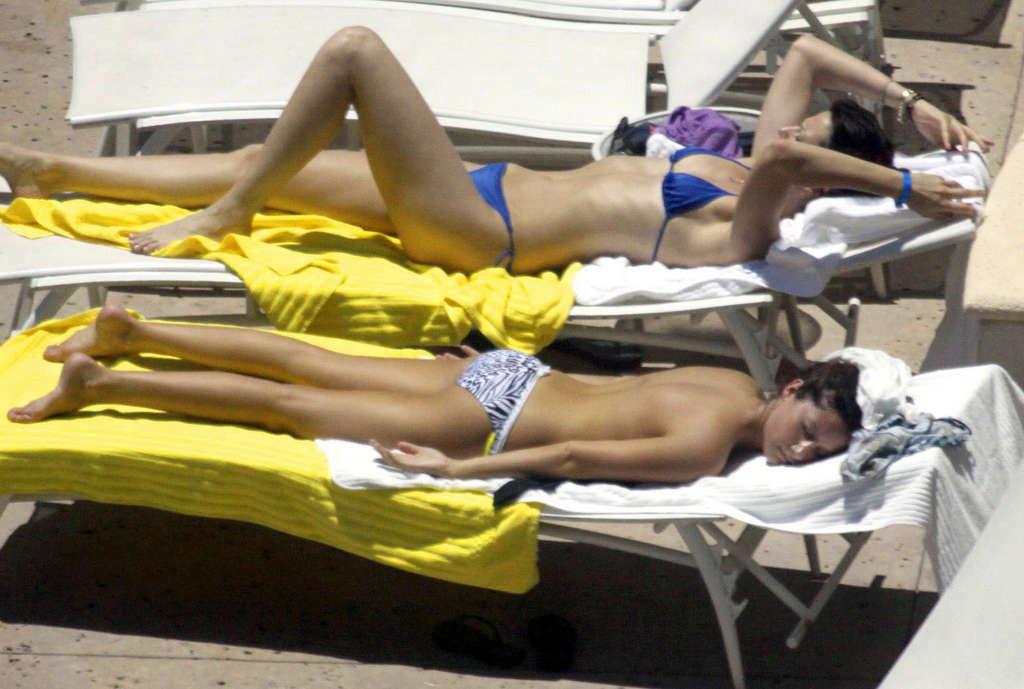 16P Ashley Tisdale in bikini relaxes poolside at her Miami hotel with friends