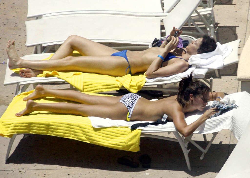 16P Ashley Tisdale in bikini relaxes poolside at her Miami hotel with friends