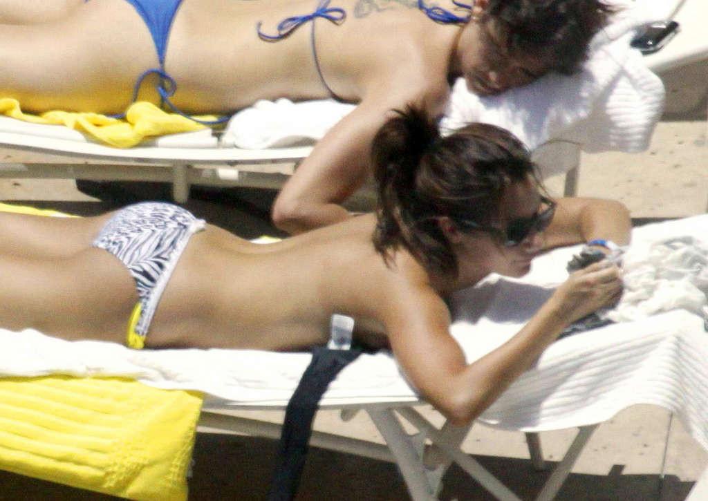 16P Ashley Tisdale in bikini relaxes poolside at her Miami hotel with friends