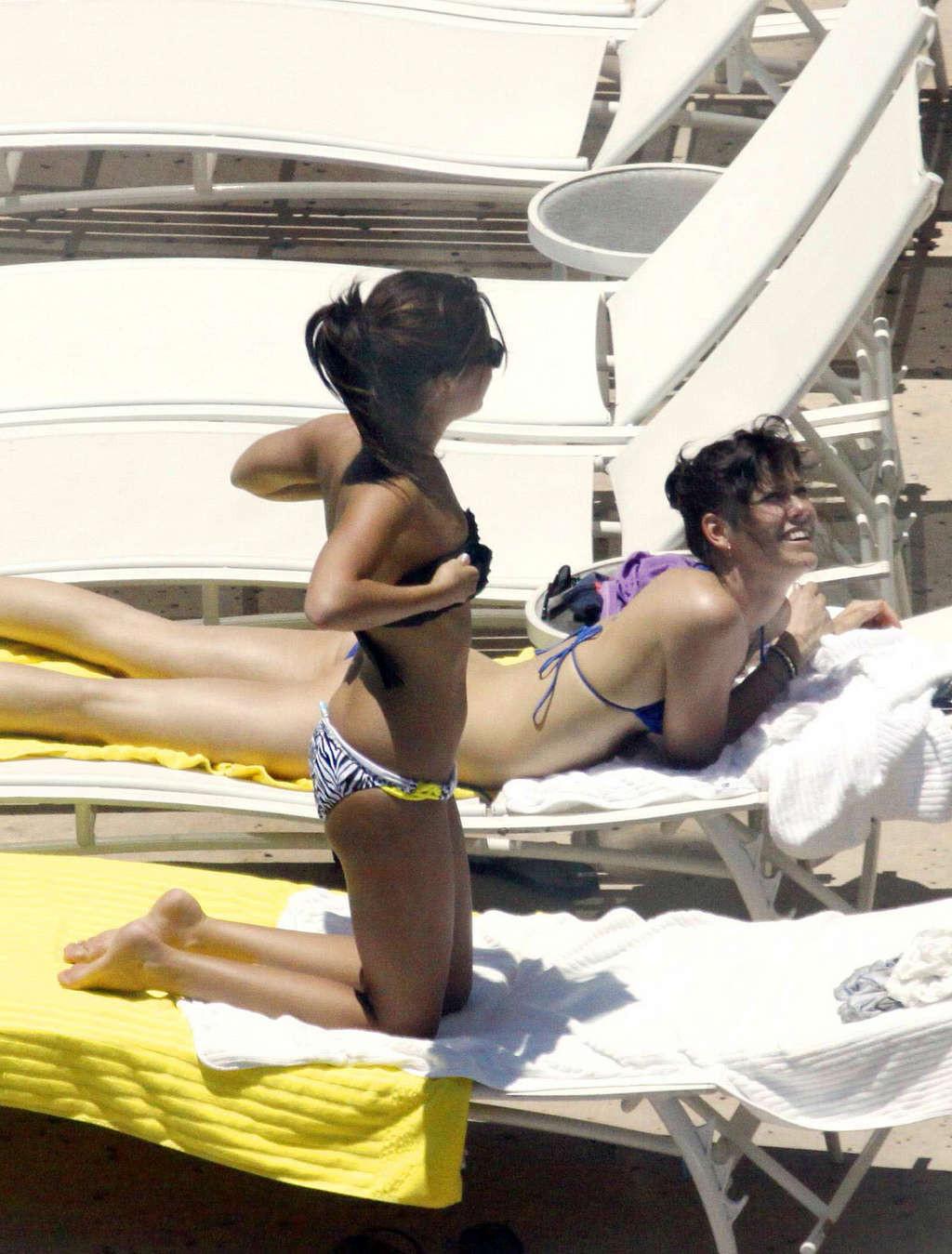 16P Ashley Tisdale in bikini relaxes poolside at her Miami hotel with friends