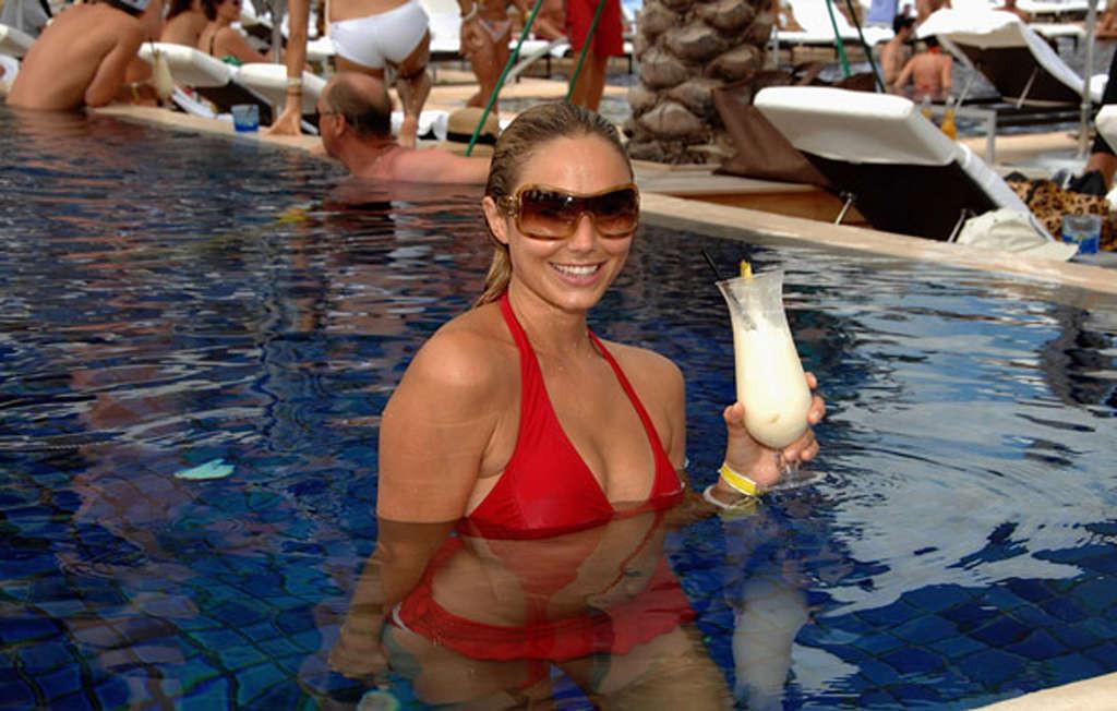 16P Stacy Keibler showing her perfect body and nice sexy ass on the beach