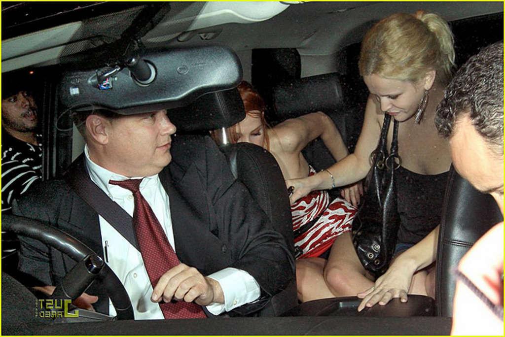 10P Ashlee Simpson exposing panties upskirt in car paparazzi pictures and great legs