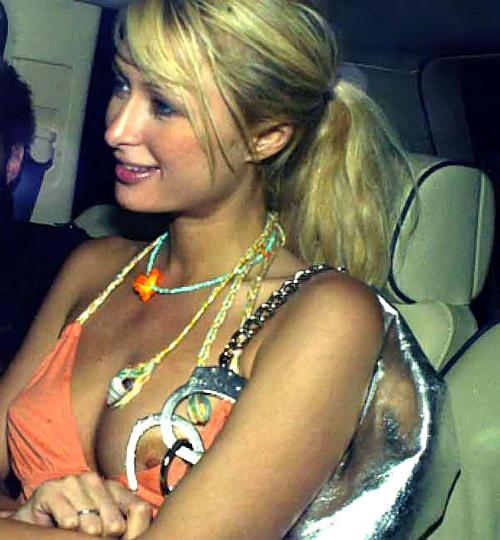 10P Paris Hilton nipple slip and upskirt in car paparazzi pictures and showing her t