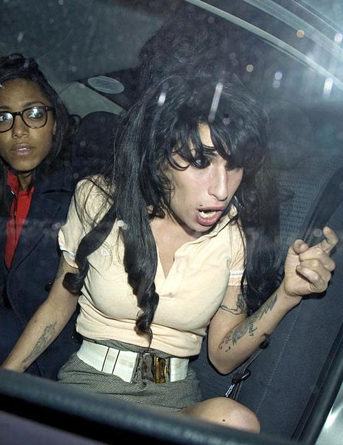 13P Amy Winehouse showing her panties upskirt in car paparazzi pictures