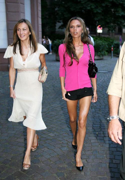 16P Victoria Beckham showing her nice big tits and upskirt in car