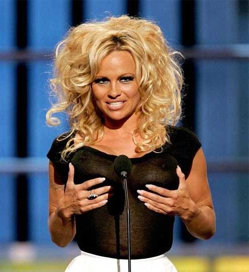 16P Pamela Anderson big tit slip on stage and nice upskirt in car paparazzi pictures