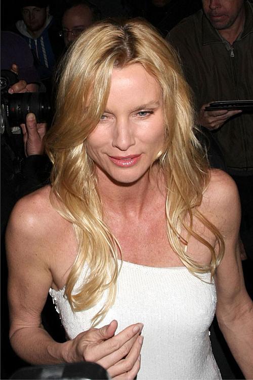 16P Nicollette Sheridan nice upskirt in car paparazzi pictures