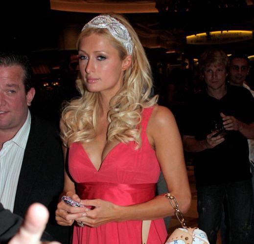 16P Paris Hilton showing her nice shaved pussy in car