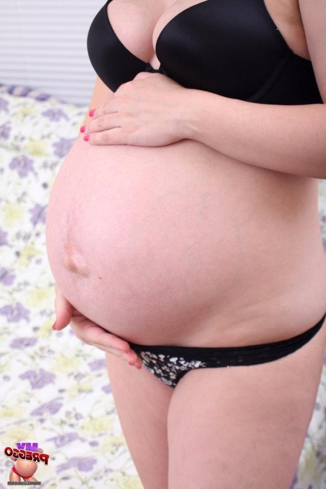 15P Pregnant teen with swollen belly and tits uses magic wand vibrator to masturbate