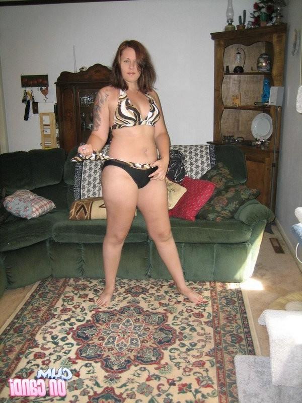 15P Candi Taking Her Clothes Off By The Couch