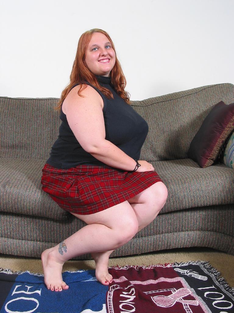 20P Big tit bbw teasing on a couch