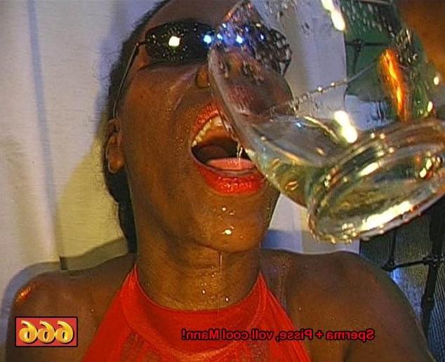 16P Guys jerk off all over her black face then piss on her