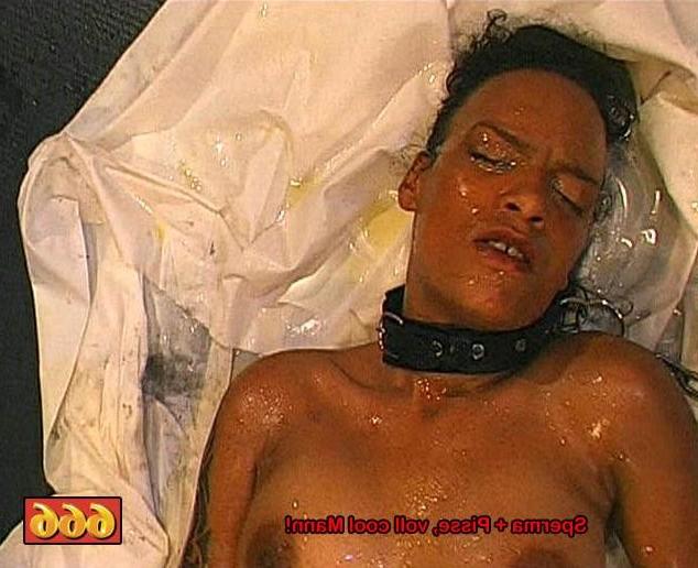 16P Guys jerk off all over her black face then piss on her