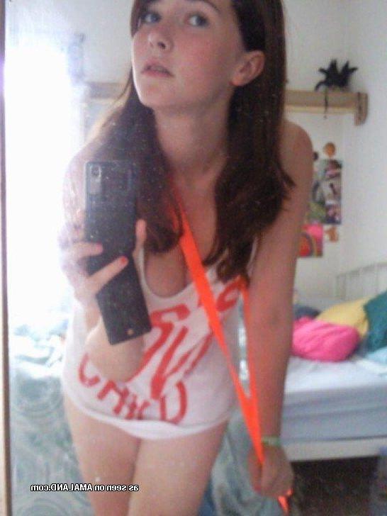 14P Pics of a brunette cutie posing in various sexy outfits