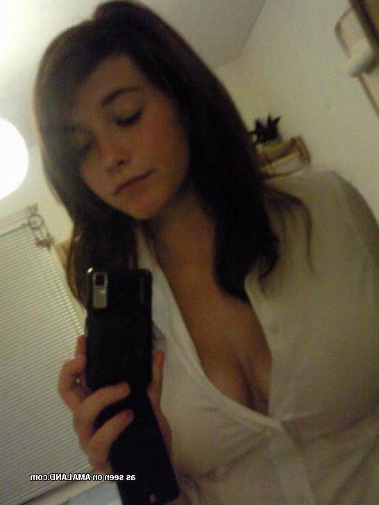 14P Pics of a brunette cutie posing in various sexy outfits
