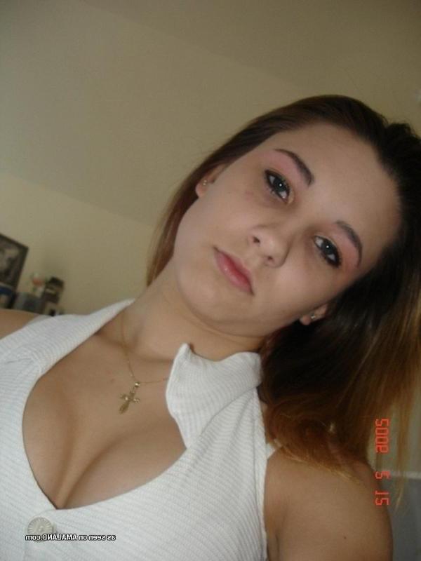 14P Redhead chick self-shooting in sexy clothes and lingerie