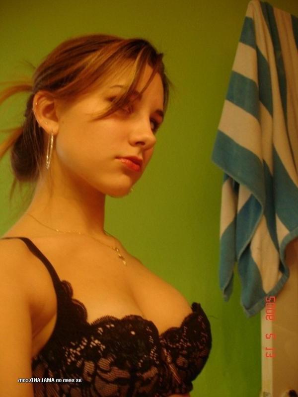 14P Redhead chick self-shooting in sexy clothes and lingerie