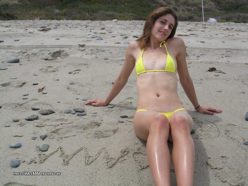 10P Collection of a slim brunette posing in her yellow bikini