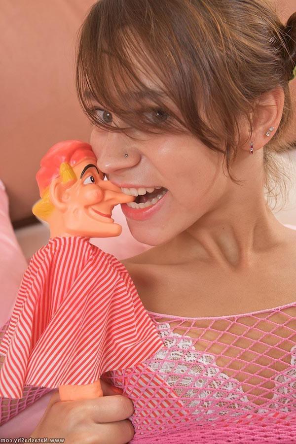 17P Charming playful teenie having fun with her favorite toys in bed