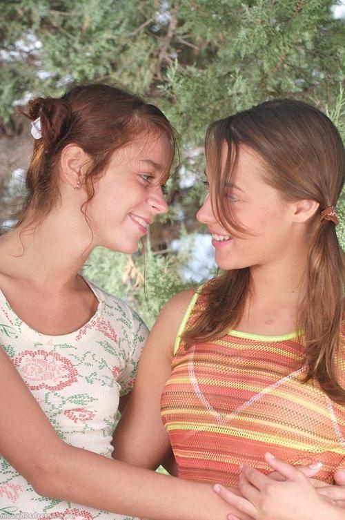 17P Two young lovely lezzies kissing and teasing each other