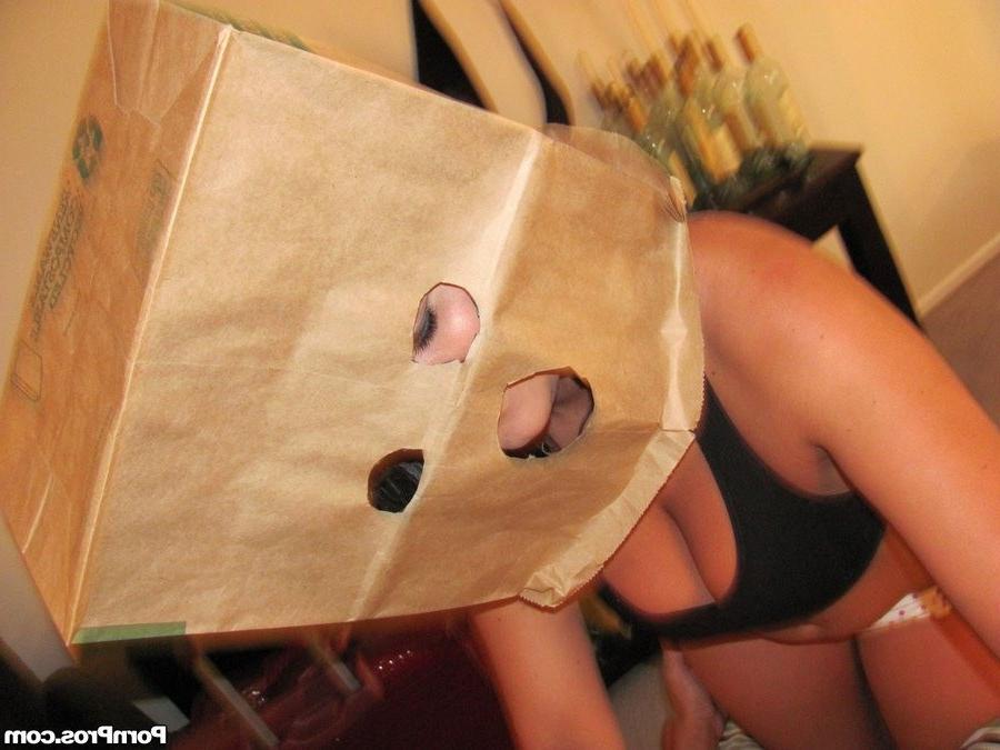 16P Busty chick with a bag over the head gets fucked