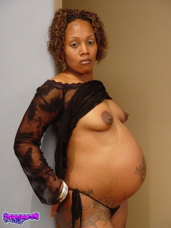 16P Pregnant chick with perky tits and nice belly takes off clothes