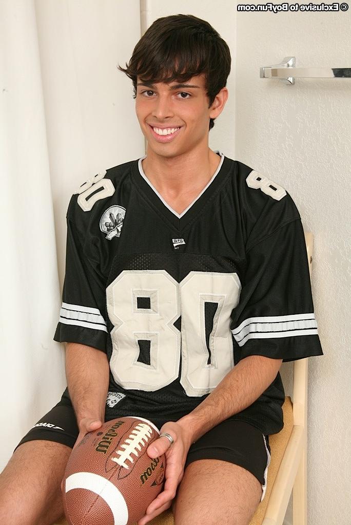 15P Athletic boy Sterling stuffs football into his ass.