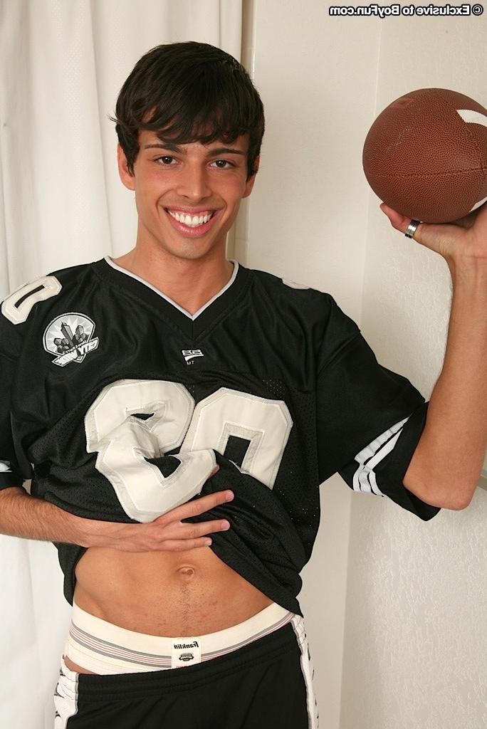 15P Athletic boy Sterling stuffs football into his ass.