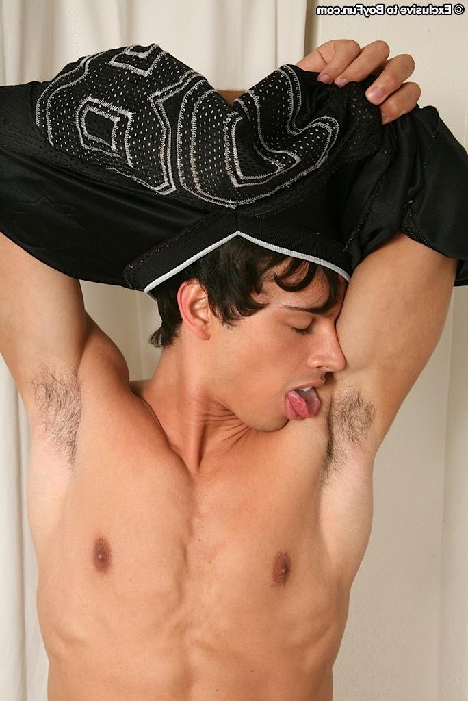 15P Athletic boy Sterling stuffs football into his ass.