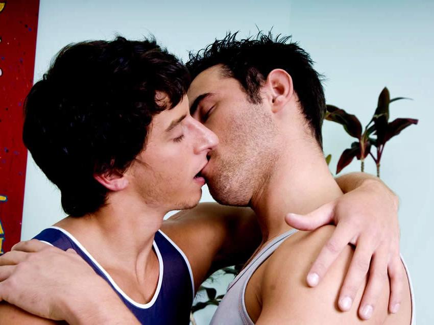 15P Two athletic jocks kissing and giving head