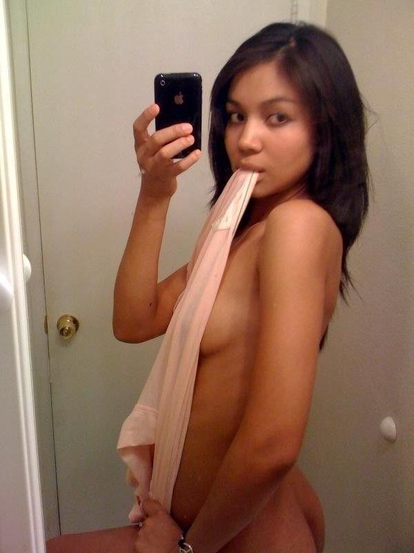15P Latina teen lifts her shirt and shows her tiny a cup booobies