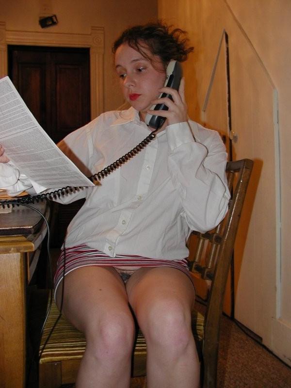 16P Upskirt voyeur peeks at young secretary pussy with no panties on