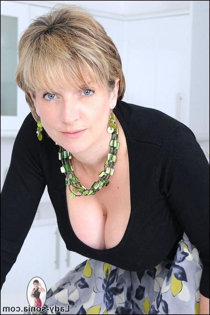 15P Busty housewife Sonia in the kitchen
