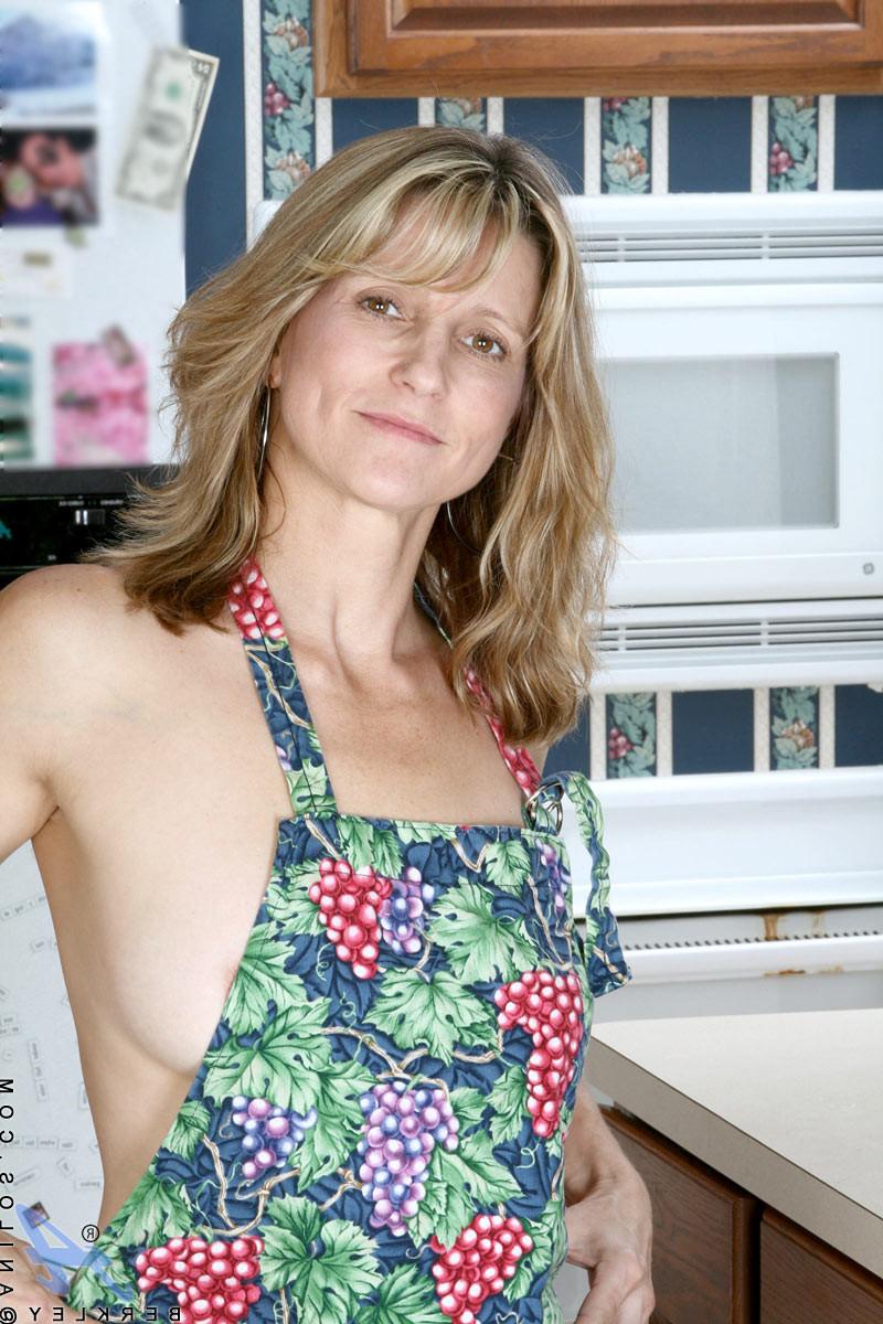 10P Brown eyed cougar shows off her perky tits