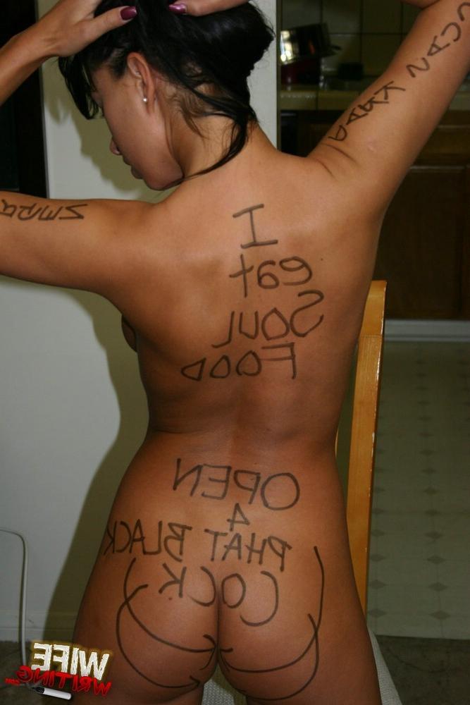 16P Busty babe with writings all over her body sucks a black cock