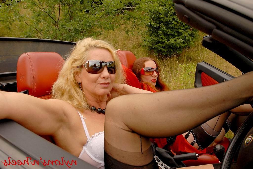 12P Lesbian legs lovers in the car